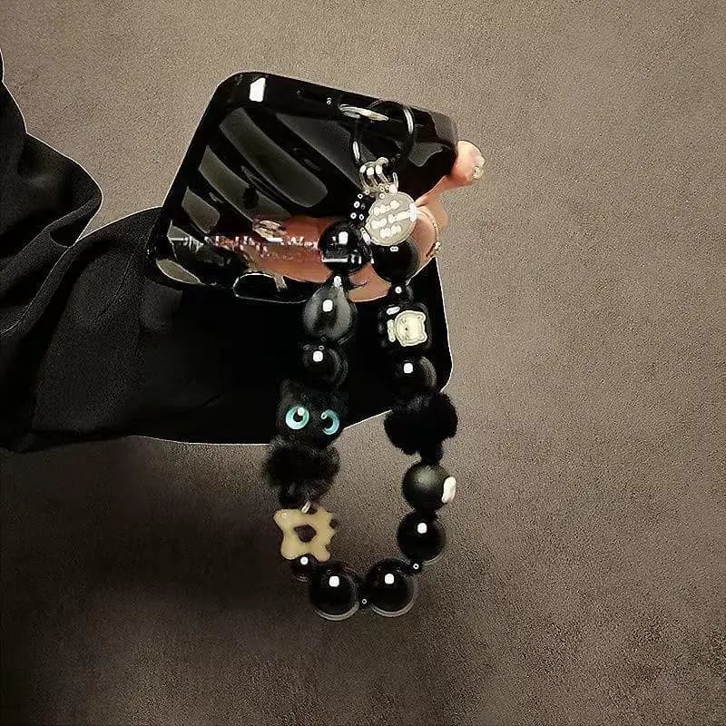 Dragonne de téléphone portable de luxe noire en fourrure avec chaîne perlée, clip anti-vol pour poig