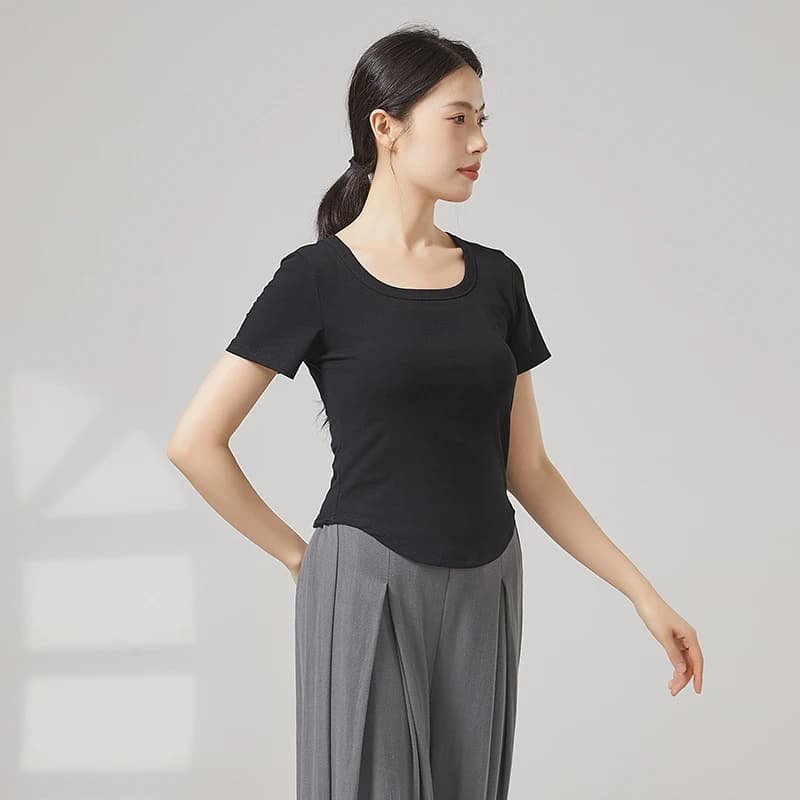 Femmes moderne haut de danse à manches courtes col rond T-Shirt couleur unie ourlet rond vêtements d