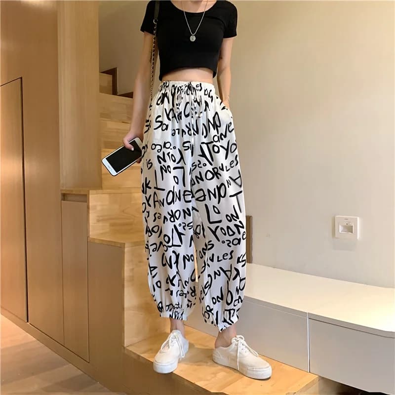 Pantalon de jogging pour femme à imprimé lettres graffiti, taille élastique, coupe ample décontracté