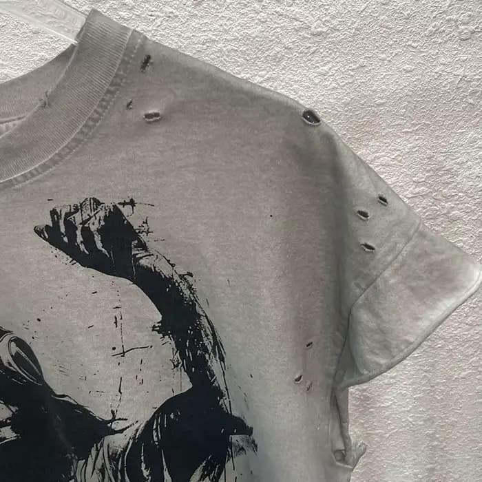 High Street sale endommagé trou dieu est un DJ débardeurs hommes femmes surdimensionné Saint manches-coupées T-Shirt