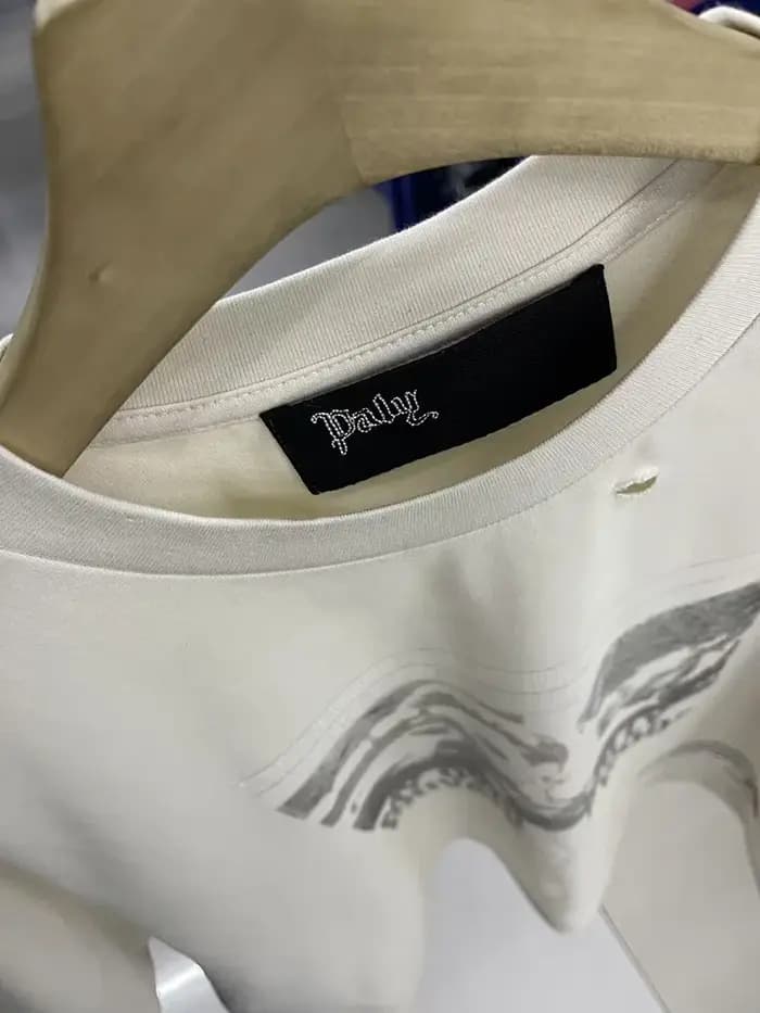 Streetwear PALY t-shirt hommes femme lavé faire vieux endommagé décontracté Couple printemps été mode ample à manches