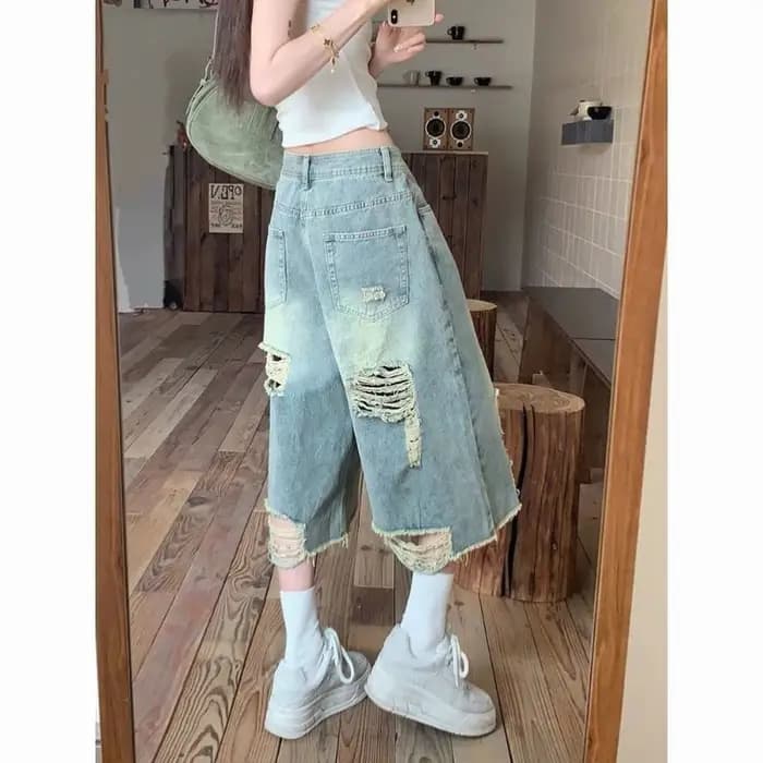 Short en jean déchiré à taille haute et coupe ample