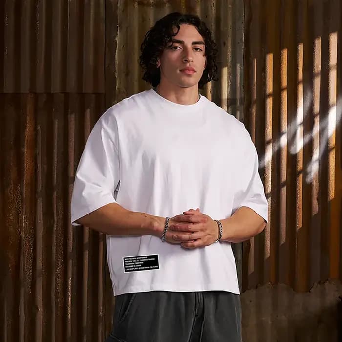 Surdimensionné Boxy abandonné demi manches poids lourd sport T-Shirts épaules hommes course