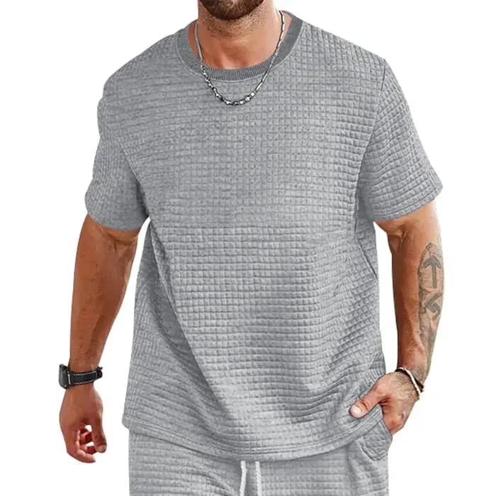 Nouveau T-shirt à manches courtes uni à col rond et petits carreaux pour homme