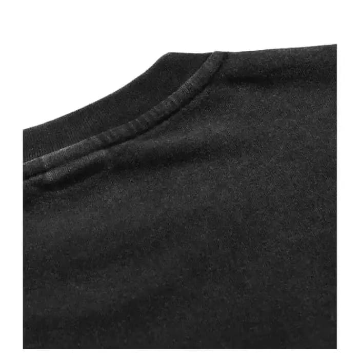 T-shirt noir oversize unisexe en coton délavé style vintage avec motif Jojo