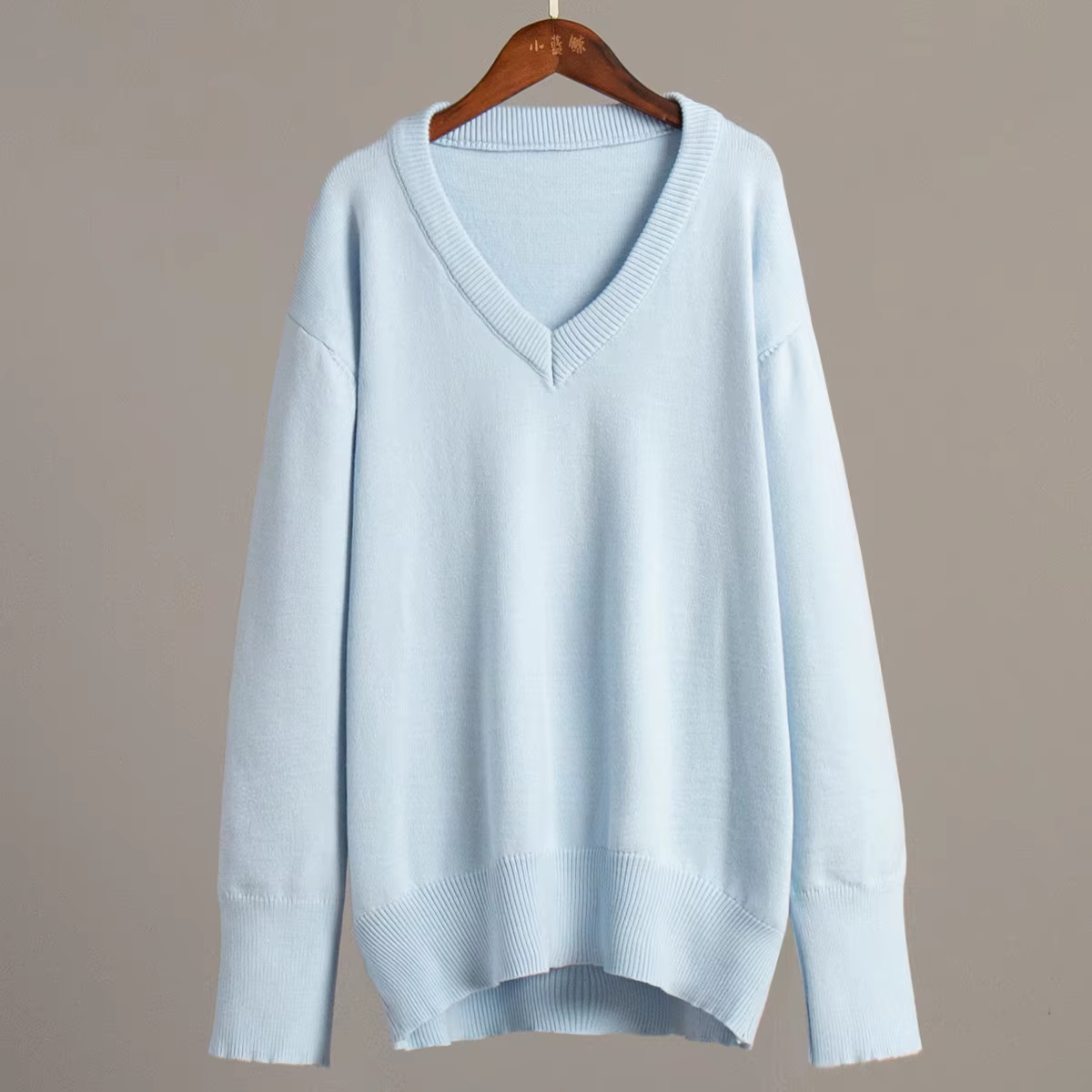 Pull à col en v femmes 2025 automne et hiver couleur unie européenne et américaine pull polyvalent p