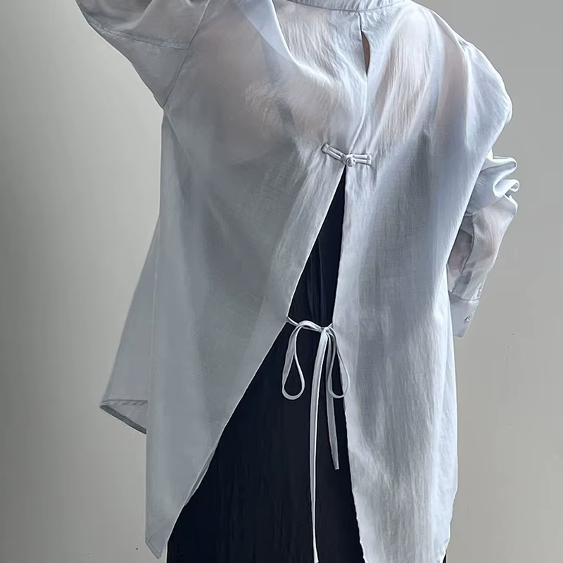 Mode revers dos nu à lacets noeud chemises femme vêtements 2025 été nouveau ample décontracté hauts 