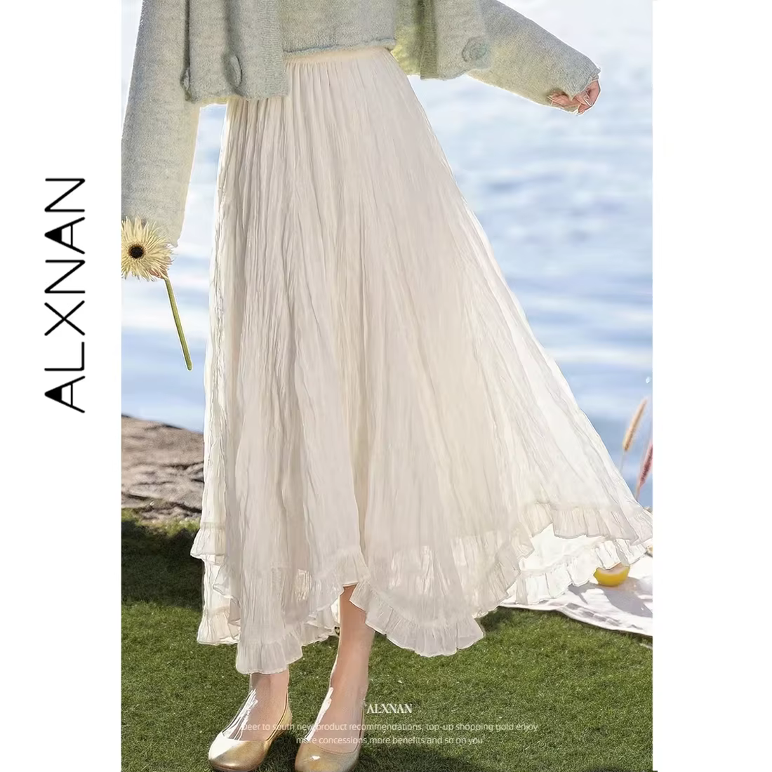 Jupe plissée longue trapèze asymétrique ALXNAN pour femme, collection Printemps 2026, couleur abrico