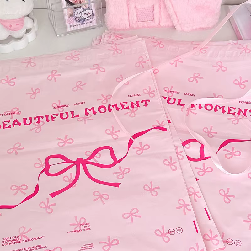 Sac de courrier en plastique rose avec nœud mignon, impression de vêtements, emballage de stockage m