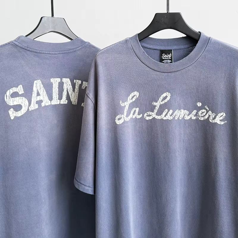 T-shirt décontracté unisexe Saint La Lumière avec logo imprimé lettres craquelées, en coton de quali