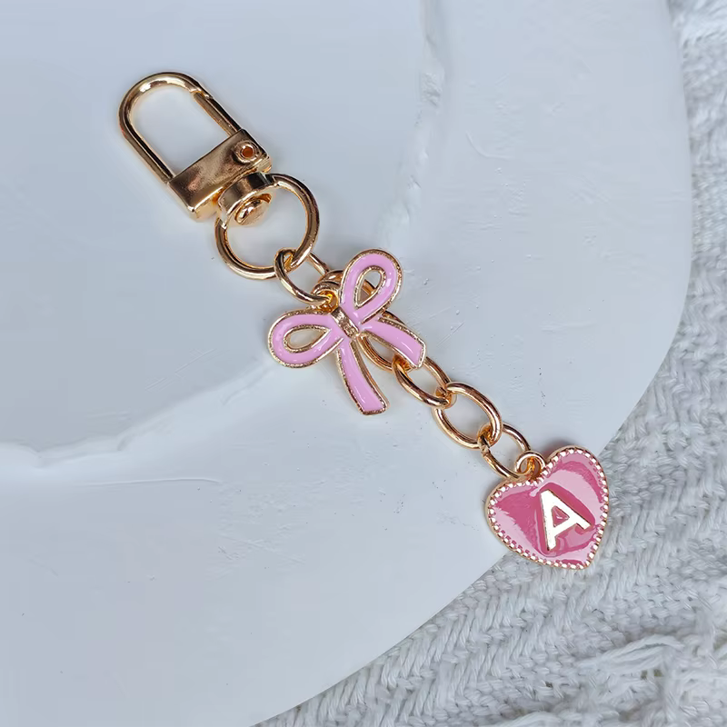 Porte-clés créatif en métal avec nœud rose, lettres de l'alphabet A-Z, breloques pour téléphone port