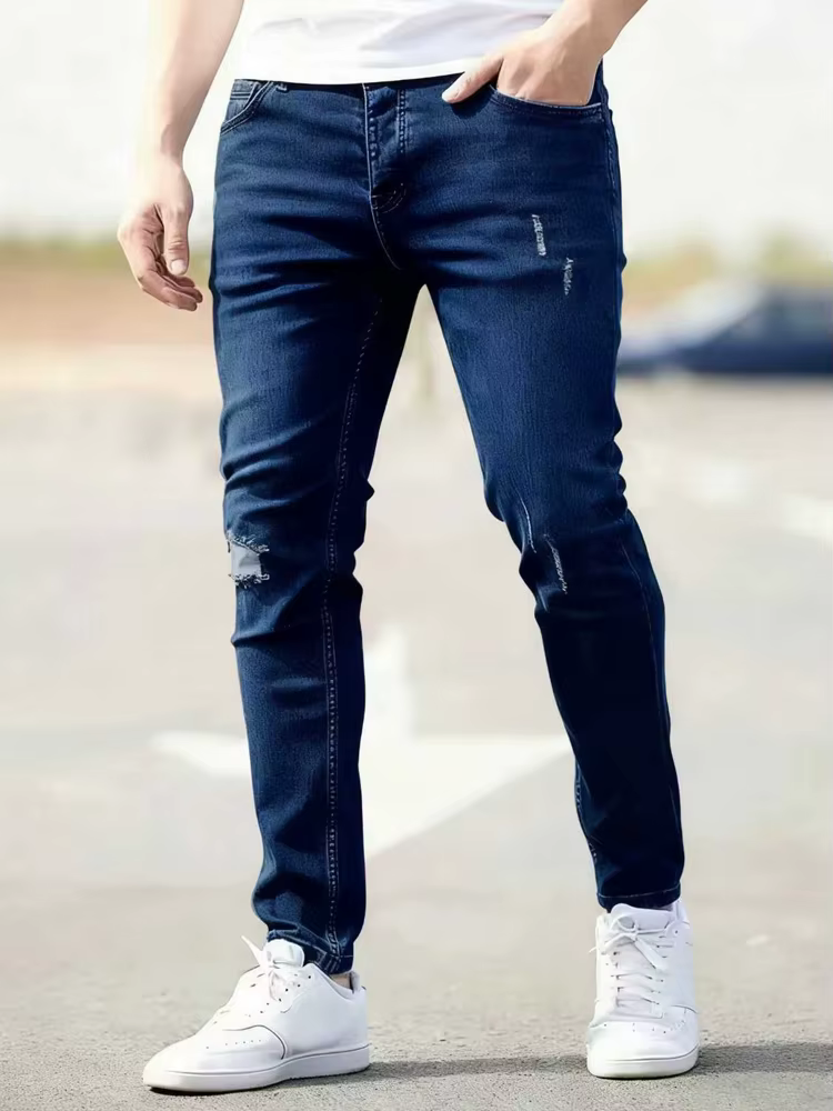 Jean skinny déchiré pour homme, collection Printemps 2026, délavage vintage, élastique, style motard