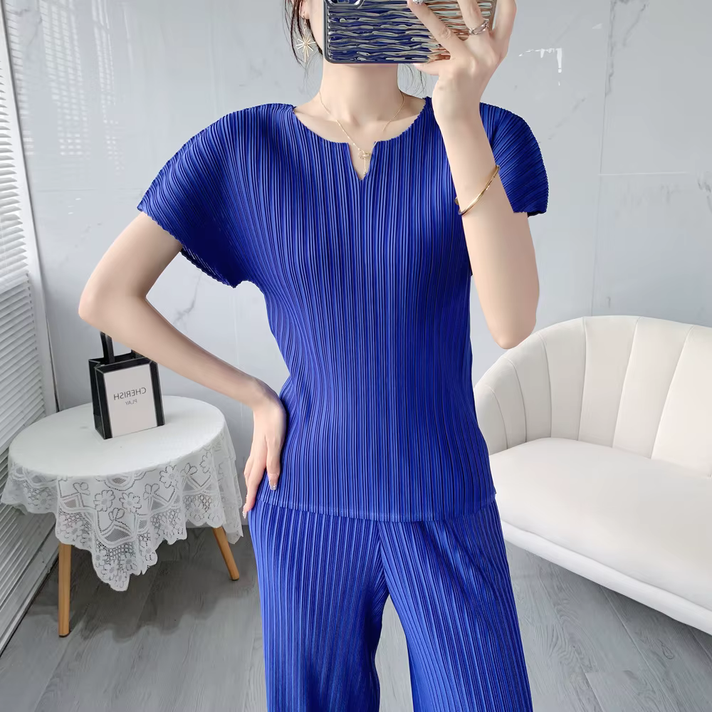 Miyake mode été plissé à manches courtes 2025 Miyake femmes rétro couleur unie vêtements décontracté
