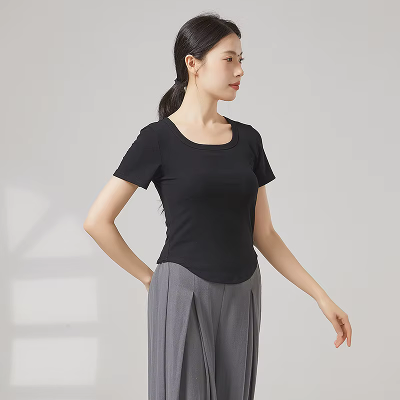 Femmes moderne haut de danse à manches courtes col rond T-Shirt couleur unie ourlet rond vêtements d