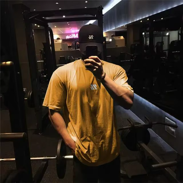 Hommes marque sport T-shirt hommes à manches courtes coton T-shirt Fitness musculation lâche course 