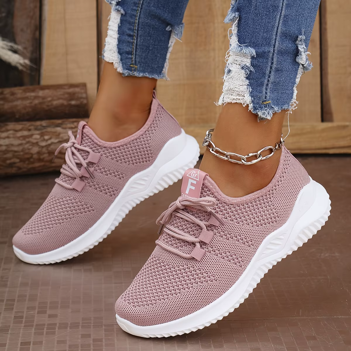 Chaussures de sport de loisirs pour femmes de couleurs unies avec tige en tricot et semelles souples