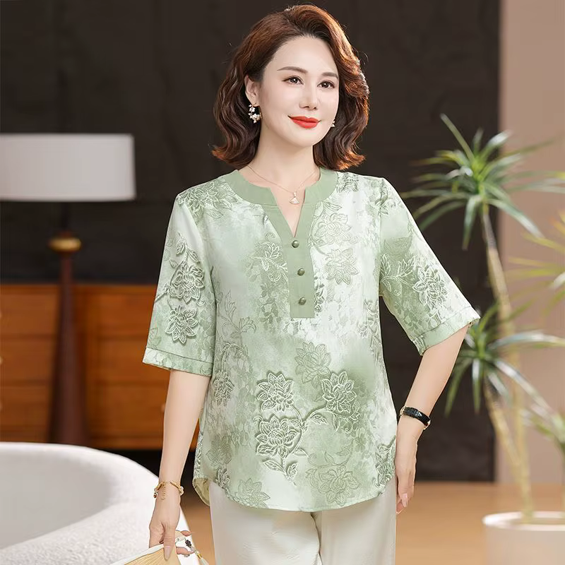 Tempérament vêtements d'été mince imprimé pull T-shirt décontracté ample 7 quarts manches haut