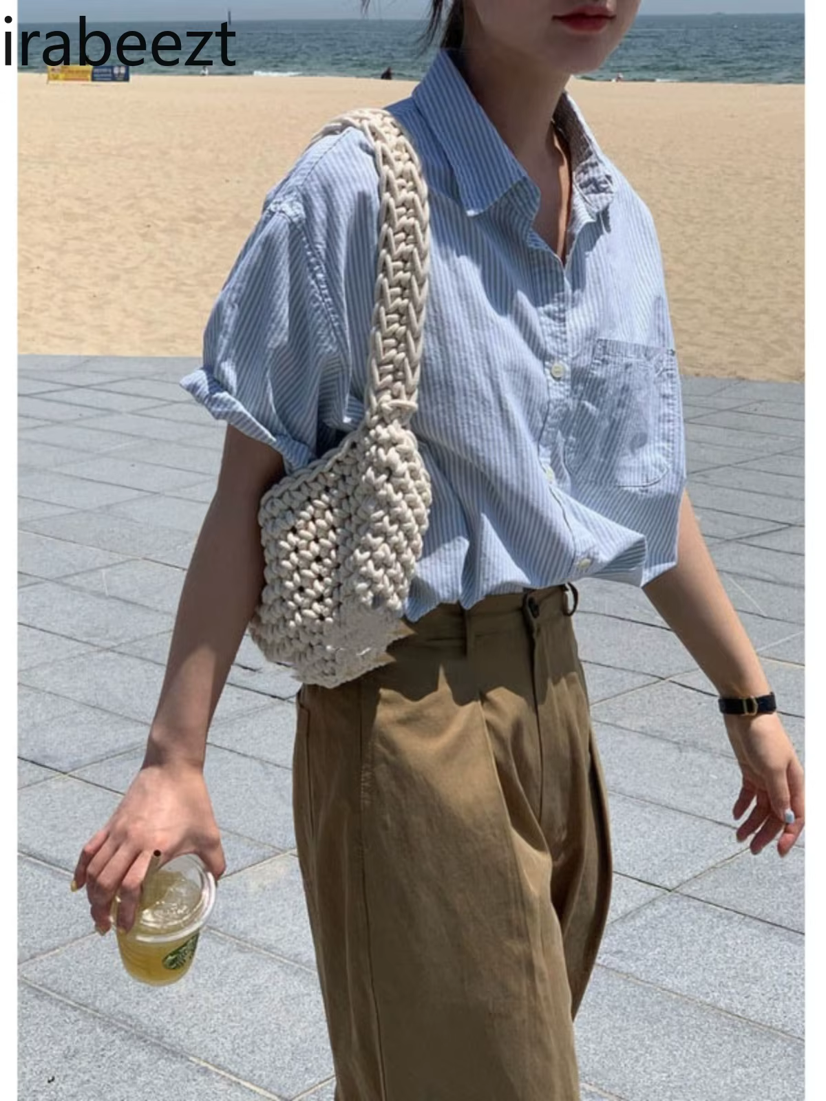 Chemise à rayures bleues manches courtes femmes été 2025 nouveau col Polo chemise Design Niche beaux